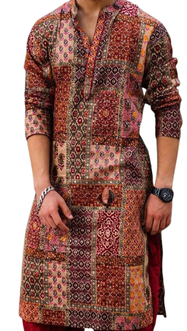Person wearing a patchwork-patterned traditional kurta with intricate designs.